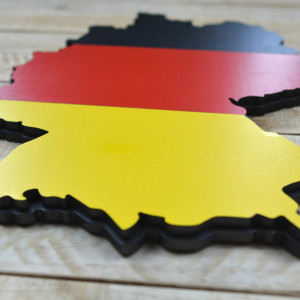 Germany in wood - layered flag in the shape of national borders