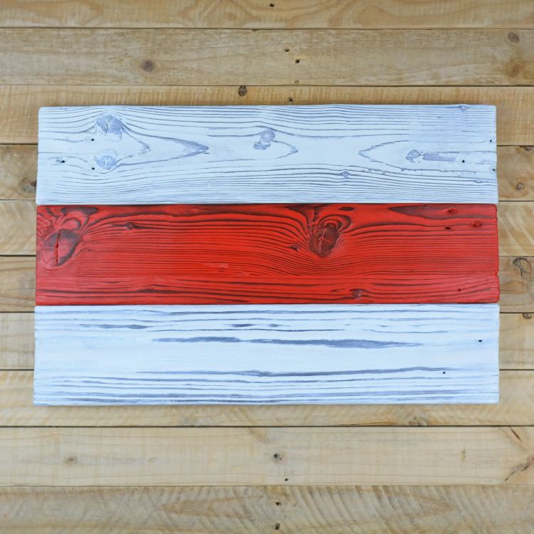 Flag of free Belarus made of old wood